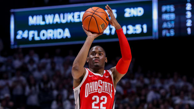 Ohio State Buckeyes guard Malaki Branham (22) shoots a basket against the Xavier Musketeers in the first half at Cintas Center.